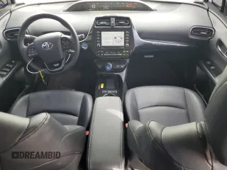 2021 Toyota Prius L Eco with VIN JTDKAMFUXM3149396, listed as a Copart auction lot 61874195 with 126,473 mi miles and Salvage title. Bid and sale history available at DreamBid. Image 8.