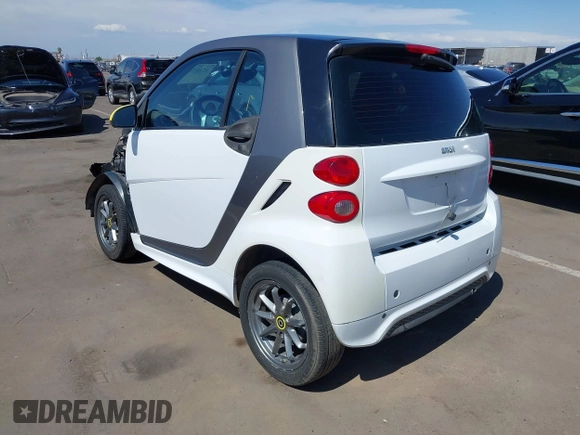 2014 Smart fortwo Pure с VIN WMEEJ3BA3EK741265, выставлен на аукционе IAAI как лот 42185357 с пробегом 56 753 миль миль и . История ставок и продаж доступна на DreamBid. Изображение 3.
