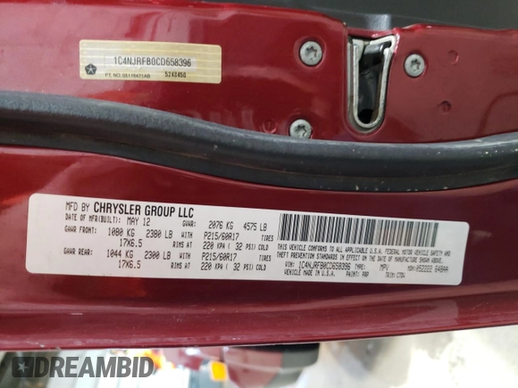 2012 Jeep Patriot Latitude with VIN 1C4NJRFB0CD658396, listed as a Copart auction lot 50601405 with 84,450 mi miles and Salvage Title. Bid and sale history available at carsss.com. Image 15.