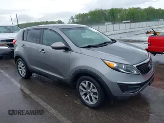 2015 Kia Sportage LX with VIN KNDPB3AC1F7784479, listed as a IAAI auction lot 42124599 with 137,190 mi miles and . Bid and sale history available at carsss.com. Image 1.