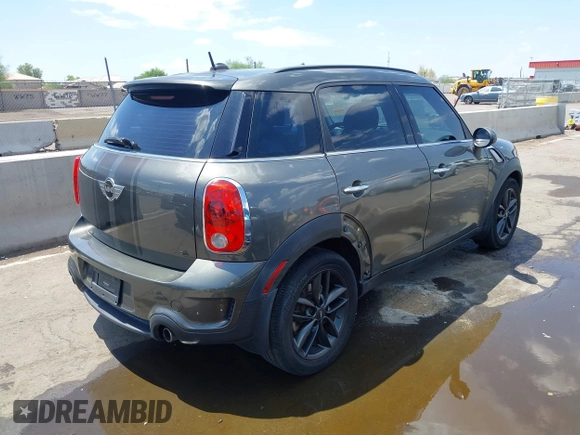 2014 MINI Countryman S with VIN WMWZC3C59EWP29137, listed as a IAAI auction lot 42661922 with 128,064 mi miles and . Bid and sale history available at DreamBid. Image 4.