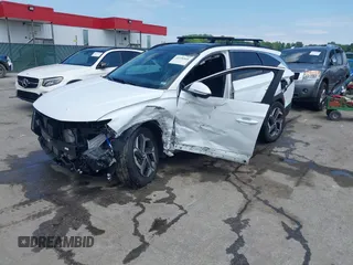 2022 Hyundai Tucson SEL Convenience with VIN KM8JFCA1XNU057877, listed as a IAAI auction lot 42256860 with 54,425 mi miles and . Bid and sale history available at DreamBid. Image 2.