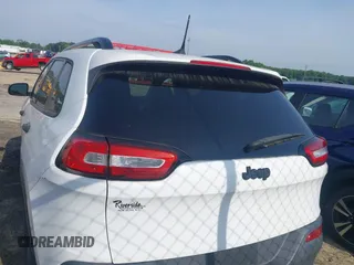 2016 Jeep Cherokee Altitude with VIN 1C4PJLABXGW323881, listed as a IAAI auction lot 42289189 with 147,631 mi miles and . Bid and sale history available at DreamBid. Image 16.