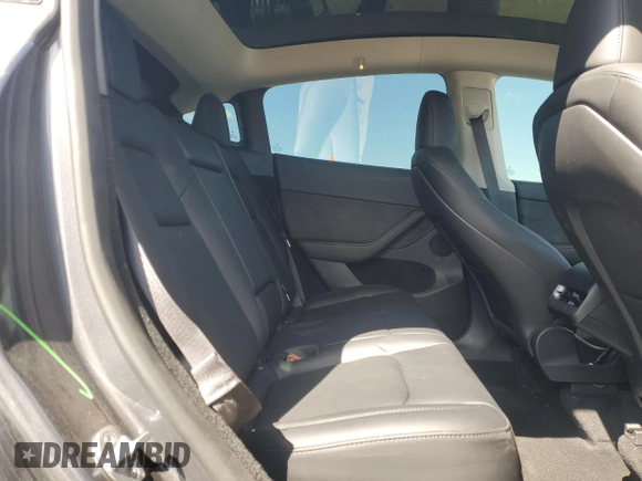 2023 Tesla Model Y Performance with VIN 7SAYGDEF3PF946496, listed as a Copart auction lot 50800315 with 15,077 mi miles and Salvage Title. Bid and sale history available at DreamBid. Image 11.