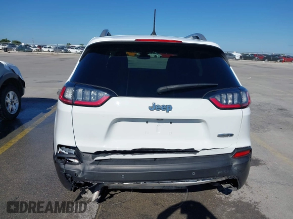 2021 Jeep Cherokee Altitude with VIN 1C4PJLLB5MD173828, listed as a IAAI auction lot 42234912 with 66,400 mi miles and . Bid and sale history available at DreamBid. Image 6.