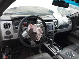 2011 Ford F-150 Lariat with VIN 1FTFW1E63BFB80098, listed as a IAAI auction lot 42038087 with 243,992 mi miles. Bid and sale history available at carsss.com. Image 18.