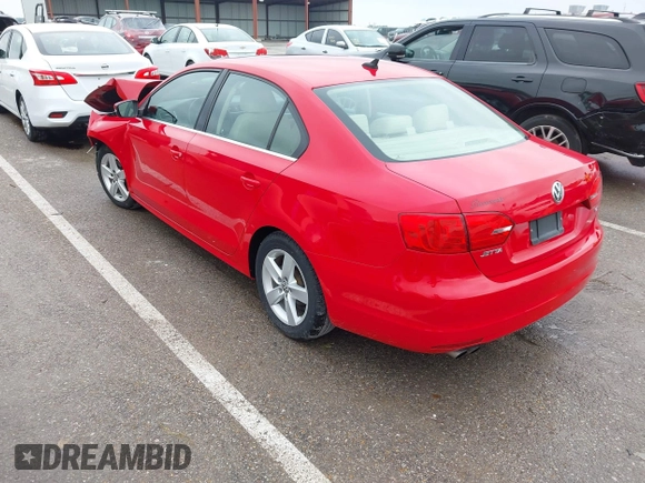 2014 Volkswagen Jetta TDI w/Premium/Nav with VIN 3VWLL7AJ4EM383351, listed as a IAAI auction lot 42424074 with 66,824 mi miles and . Bid and sale history available at DreamBid. Image 3.