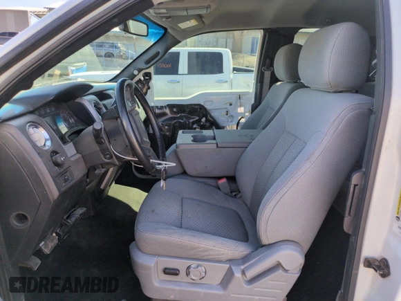2012 Ford F-150 XL with VIN 1FTFX1ETXCFC98234, listed as a Copart auction lot 49923535 with 150,106 mi miles and Salvage title. Bid and sale history available at DreamBid. Image 7.
