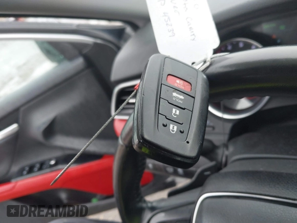 2020 Toyota Camry XSE with VIN 4T1K61AK1LU318098, listed as a IAAI auction lot 41097712 with 64,118 mi miles and . Bid and sale history available at DreamBid. Image 11.