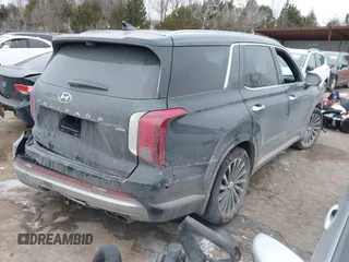 2023 Hyundai Palisade Calligraphy z VIN KM8R7DGE0PU640381, wystawiony jako IAAI lot #41601559 z przebiegiem 20 418 mil mil oraz . Historia ofert i sprzedaży dostępna na DreamBid. Obrazek 4.
