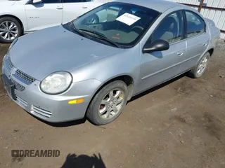 2005 Dodge Neon SXT with VIN 1B3ES56C75D273890, listed as a IAAI auction lot 42149159 with 212,741 mi miles. Bid and sale history available at carsss.com. Image 2.