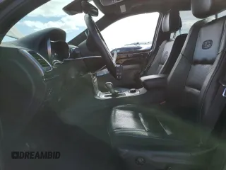 2018 Jeep Grand Cherokee High Altitude z VIN 1C4RJFCG3JC426443, wystawiony jako Copart lot #49703465 z przebiegiem 97 233 mil mil oraz Szkoda całkowita • Salvage title. Historia ofert i sprzedaży dostępna na DreamBid. Obrazek 7.