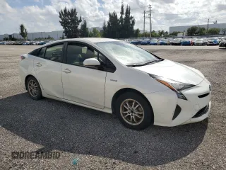 2017 Toyota Prius Two z VIN JTDKARFU6H3030019, wystawiony jako Copart lot #54850235 z przebiegiem 200 292 mil mil oraz Czysty tytuł • Clean title. Historia ofert i sprzedaży dostępna na DreamBid. Obrazek 4.