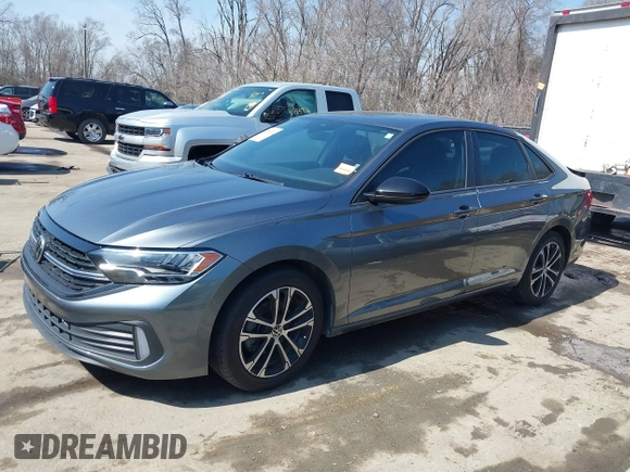 2022 Volkswagen Jetta Sport with VIN 3VWBM7BU6NM017084, listed as a IAAI auction lot 41784555 with 60,364 mi miles and . Bid and sale history available at DreamBid. Image 14.