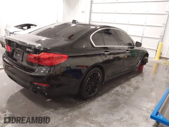 2018 BMW 5 Series 530i with VIN WBAJA5C52JWA37569, listed as a IAAI auction lot 41240799 with 80,116 mi miles and . Bid and sale history available at DreamBid. Image 4.