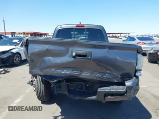 2020 Toyota Tacoma SR with VIN 3TYRX5GN4LT003040, listed as a IAAI auction lot 42121503 with 49,858 mi miles and . Bid and sale history available at DreamBid. Image 17.