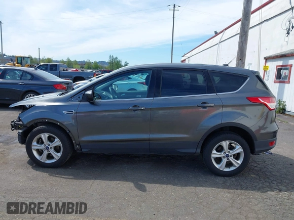 2015 Ford Escape SE with VIN 1FMCU0G75FUB31989, listed as a IAAI auction lot 42040121 with 87,068 mi miles and . Bid and sale history available at DreamBid. Image 15.