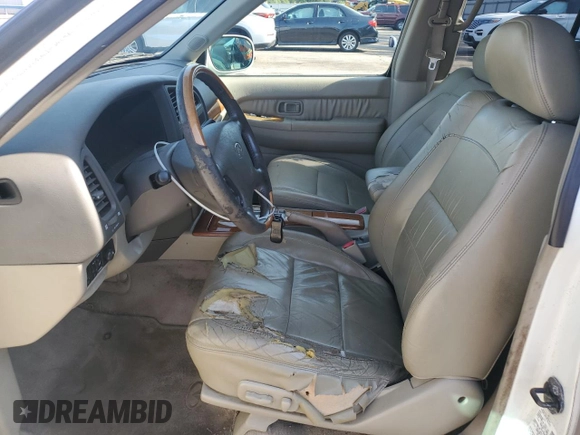 2003 Infiniti QX4 with VIN JNRDR09X33W250292, listed as a Copart auction lot 56020474 with 260,391 mi miles and Clean Title. Bid and sale history available at DreamBid. Image 7.