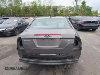 2011 Ford Fusion SE with VIN 3FAHP0HA1BR203046, listed as a IAAI auction lot 42011121 with 302,078 mi miles. Bid and sale history available at carsss.com. Image 17.