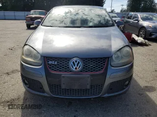 2008 Volkswagen Jetta GLI z VIN 3VWDJ71KX8M006725, wystawiony jako Copart lot #58665965 z przebiegiem 182 427 mil mil oraz Tytuł czysty. Historia ofert i sprzedaży dostępna na DreamBid. Obrazek 5.