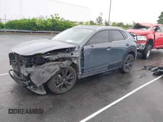 2023 Mazda CX-30 S Carbon Edition with VIN 3MVDMBCM9PM574358, listed as a IAAI auction lot 42105931 with 55,975 mi miles and . Bid and sale history available at DreamBid. Image 18.