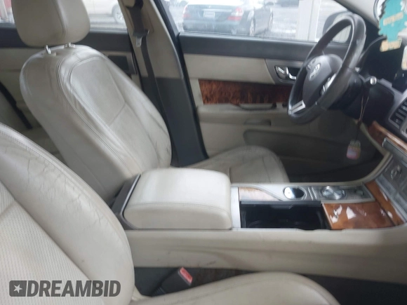 2009 Jaguar XF Premium Luxury with VIN SAJWA06B39HR04506, listed as a IAAI auction lot 42122756 with 205,008 mi miles and . Bid and sale history available at DreamBid. Image 5.