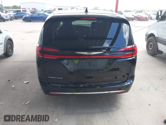 2023 Chrysler Pacifica Touring L with VIN 2C4RC1BG1PR550628, listed as a IAAI auction lot 42553430 with 61,773 mi miles and . Bid and sale history available at DreamBid. Image 17.