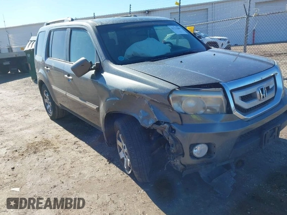 2010 Honda Pilot Touring with VIN 5FNYF4H93AB008589, listed as a IAAI auction lot 41731084 with 138,554 mi miles and . Bid and sale history available at carsss.com. Image 1.