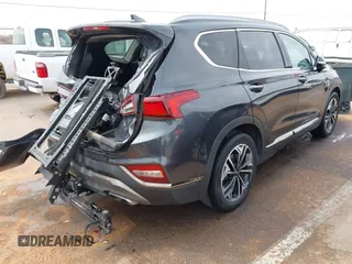 2020 Hyundai Santa Fe Limited with VIN 5NMS53AA8LH213608, listed as a IAAI auction lot 41787079 with 53,634 mi miles and . Bid and sale history available at DreamBid. Image 4.