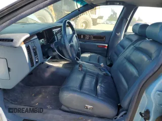 1996 Cadillac Fleetwood z VIN 1G6DW52P4TR713395, wystawiony jako Copart lot #43005075 z przebiegiem Nie podano mil oraz Tytuł czysty. Historia ofert i sprzedaży dostępna na DreamBid. Obrazek 7.