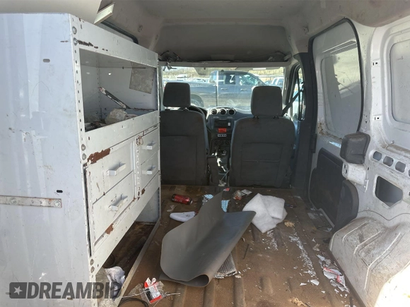 2012 Ford Transit Connect XL z VIN NM0LS7AN2CT097714, wystawiony jako IAAI lot #42141784 z przebiegiem 19 438 mil mil oraz . Historia ofert i sprzedaży dostępna na DreamBid. Obrazek 1.