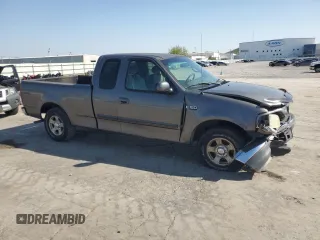 2002 Ford F-150 XL with VIN 1FTRX17222KA58070, listed as a Copart auction lot 52186295 with 0 mi miles and Salvage Title. Bid and sale history available at carsss.com. Image 4.