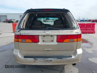 2002 Honda Odyssey EX-L z VIN 2HKRL18042H567858, wystawiony jako IAAI lot #41686147 z przebiegiem 264 570 mil mil oraz . Historia ofert i sprzedaży dostępna na DreamBid. Obrazek 16.