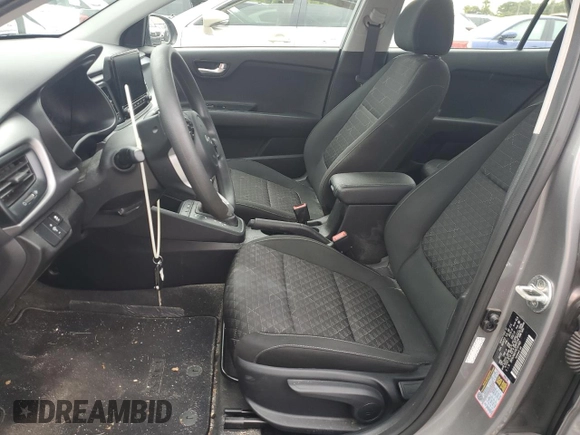 2023 Kia Rio S with VIN 3KPA24AD1PE531460, listed as a Copart auction lot 74285564 with 22,255 mi miles and Salvage Title. Bid and sale history available at DreamBid. Image 7.