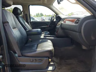 2011 Chevrolet Suburban LT with VIN 1GNSKJE34BR151246, listed as a IAAI auction lot 42520210 with 239,240 mi miles and . Bid and sale history available at DreamBid. Image 5.