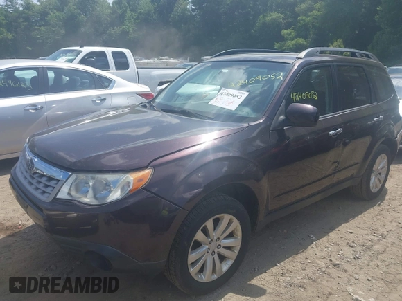 2013 Subaru Forester X Premium with VIN JF2SHADCXDH427822, listed as a IAAI auction lot 42409052 with 125,402 mi miles and . Bid and sale history available at DreamBid. Image 2.