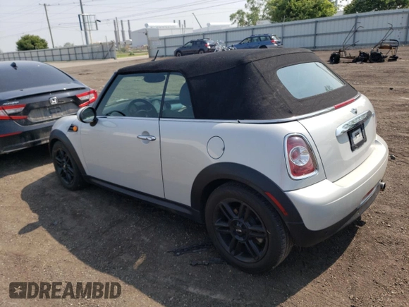 2014 MINI Convertible z VIN WMWZN3C55ET861050, wystawiony jako Copart lot #60014125 z przebiegiem 101 524 mil mil oraz Czysty tytuł • Clean title. Historia ofert i sprzedaży dostępna na DreamBid. Obrazek 2.