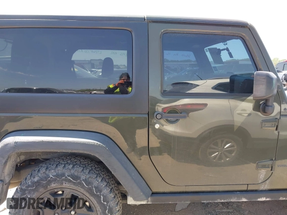 2015 Jeep Wrangler Sport with VIN 1C4AJWAGXFL650428, listed as a IAAI auction lot 42010629 with 80,039 mi miles. Bid and sale history available at carsss.com. Image 13.