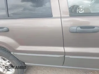 2002 Jeep Grand Cherokee Laredo with VIN 1J4GX48S32C168105, listed as a IAAI auction lot 42451373 with 293,790 mi miles and . Bid and sale history available at DreamBid. Image 6.
