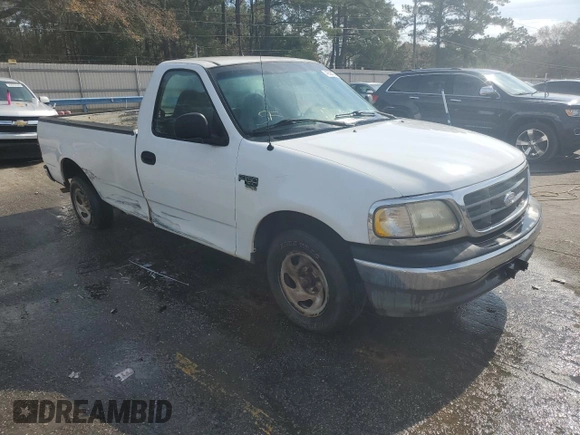 2003 Ford F-150 XL with VIN 1FTRF17W33NA54471, listed as a Copart auction lot 42594765 with 134,409 mi miles and Salvage Title. Bid and sale history available at DreamBid. Image 4.