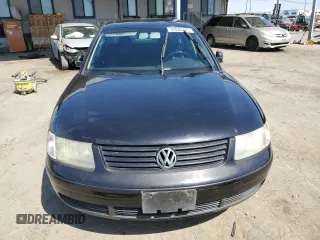2000 Volkswagen Passat GLS z VIN WVWMD23B0YP307525, wystawiony jako Copart lot #57040775 z przebiegiem 167 440 mil mil oraz Szkoda całkowita • Salvage title. Historia ofert i sprzedaży dostępna na DreamBid. Obrazek 5.