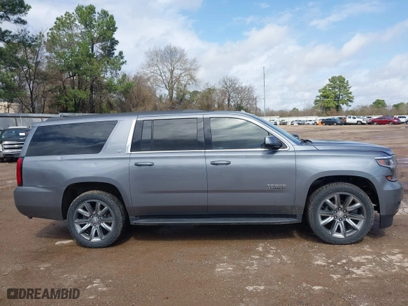 2018 Chevrolet Suburban LT with VIN 1GNSKHKC3JR207477, listed as a IAAI auction lot 41716372 with 168,601 mi miles. Bid and sale history available at carsss.com. Image 14.