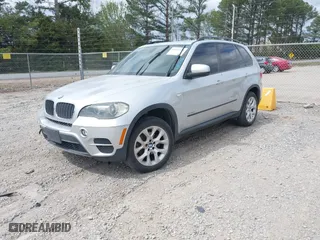 2011 BMW X5 35i with VIN 5UXZV4C52BL742911, listed as a IAAI auction lot 41845588 with 123,001 mi miles. Bid and sale history available at carsss.com. Image 2.
