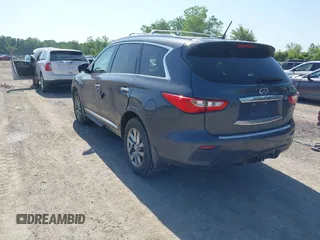2014 Infiniti QX60 with VIN 5N1AL0MM6EC506295, listed as a IAAI auction lot 42549315 with 157,766 mi miles and . Bid and sale history available at DreamBid. Image 3.