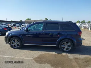 2017 Dodge Journey Crossroad Plus z VIN 3C4PDCGG1HT577447, wystawiony jako IAAI lot #42408741 z przebiegiem 157 569 mil mil oraz . Historia ofert i sprzedaży dostępna na DreamBid. Obrazek 14.