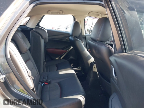 2017 Mazda CX-3 Touring z VIN JM1DKFC72H0142319, wystawiony jako IAAI lot #42223888 z przebiegiem 128 592 mil mil oraz . Historia ofert i sprzedaży dostępna na DreamBid. Obrazek 8.