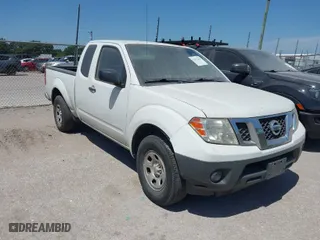 2016 Nissan Frontier S with VIN 1N6BD0CT6GN763783, listed as a IAAI auction lot 41976206 with 104,447 mi miles. Bid and sale history available at carsss.com. Image 1.