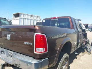 2015 Ram 2500 Laramie with VIN 3C6UR5NJ4FG647003, listed as a IAAI auction lot 41706733 with 115,764 mi miles. Bid and sale history available at carsss.com. Image 4.