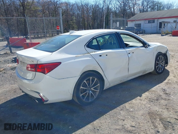 2019 Acura TLX with VIN 19UUB2F33KA003854, listed as a IAAI auction lot 41808917 with 95,380 mi miles and . Bid and sale history available at DreamBid. Image 4.