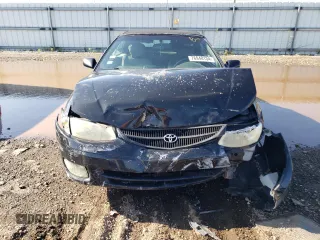 2001 Toyota Solara SE z VIN 2T1FF28P61C526694, wystawiony jako Copart lot #76948134 z przebiegiem Nie podano mil oraz Szkoda całkowita • Salvage title. Historia ofert i sprzedaży dostępna na DreamBid. Obrazek 5.